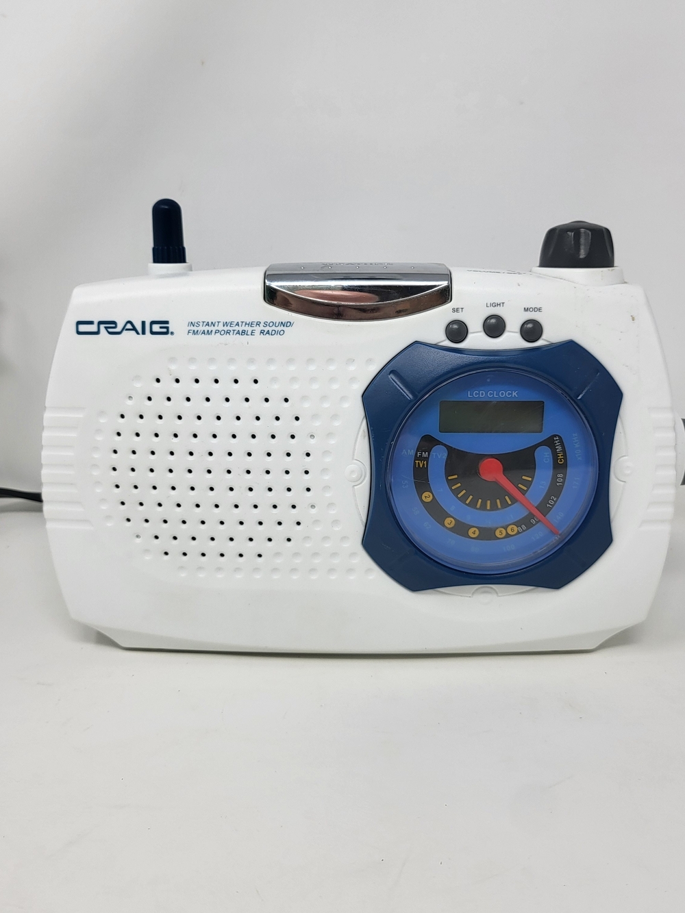 Craig White and Blue Portable AM/FM Radio with LCD Clock
